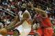 HOUSTON, TX - DECEMBER 18: James Harden #13 of the Houston Rockets drives with the ball against Jimmy Butler #21 of the Chicago Bulls during the game at Toyota Center on December 18, 2013 in Houston, Texas. NOTE TO USER: User expressly acknowledges and a