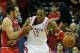 HOUSTON, TX - DECEMBER 18: Dwight Howard #12 of the Houston Rockets is grabbed unber the basket by Joakim Noah #13 of the Chicago Bulls during the game at Toyota Center on December 18, 2013 in Houston, Texas. NOTE TO USER: User expressly acknowledges an