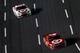 CONCORD, NC - OCTOBER 12: Juan Pablo Montoya, driver of the #42 Target Chevrolet, leads Kyle Larson, driver of the #51 Target Chevrolet, during the NASCAR Sprint Cup Series Bank of America 500 at Charlotte Motor Speedway on October 12, 2013 in Concord, N