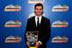 MIAMI BEACH, FL - NOVEMBER 18: NASCAR Nationwide Series SUNOCO Rookie of the Year Kyle Larson poses with his trophy during the NASCAR Nationwide Series/Camping World Truck Series banquet at the Loews Miami Beach on November 18, 2013 in Miami Beach, Flori