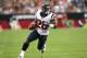 GLENDALE, AZ - NOVEMBER 10: Running back Dennis Johnson #28 of the Houston Texans carries the ball against the Arizona Cardinals at University of Phoenix Stadium on November 10, 2013 in Glendale, Arizona. (Photo by Stephen Dunn/Getty Images)