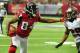 ATLANTA, GA - DECEMBER 30: Roddy White #84 of the Atlanta Falcons runs with a catch against Leonard Johnson #29 of the Tampa Bay Buccaneers at the Georgia Dome on December 30, 2012 in Atlanta, Georgia (Photo by Scott Cunningham/Getty Images)