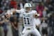 Nov 30, 2013; Houston, TX, USA; Tulane Green Wave quarterback Nick Montana (11) attempts a pass during the fourth quarter against the Rice Owls at Rice Stadium. Mandatory Credit: Troy Taormina-USA TODAY Sports