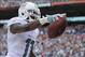 Dec 15, 2013; Miami Gardens, FL, USA; Miami Dolphins wide receiver Mike Wallace (11) celebrates his touchdown against the New England Patriots in the first half of the game at Sun Life Stadium. Mandatory Credit: Brad Barr-USA TODAY Sports