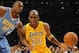 Oct 6, 2013; Los Angeles, CA, USA; Los Angeles Lakers guard Jodie Meeks (20) works against Denver Nuggets forward Darrell Arthur (00) during the first half at Staples Center. Mandatory Credit: Christopher Hanewinckel-USA TODAY Sports