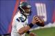 Dec 15, 2013; East Rutherford, NJ, USA; Seattle Seahawks quarterback Russell Wilson (3) holds the ball after running out of bounds against the New York Giants during the second half at MetLife Stadium. Mandatory Credit: Joe Camporeale-USA TODAY Sports