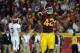 LOS ANGELES, CA - SEPTEMBER 10: Devon Kennard #42 of the USC Trojans celebrates a stop on third down as Jordan Wynn #3 of the Utah Utes leaves the field during the fourth quarter at Los Angeles Memorial Coliseum on September 10, 2011 in Los Angeles, Cali