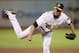 OAKLAND, CA - SEPTEMBER 6: Closing pitcher Grant Balfour #50 of the Oakland Athletics follows through on a pitch against the Houston Astros in the ninth inning at O.co Coliseum on September 6, 2013 in Oakland, California. The A's won 7-5. (Photo by Bri
