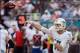 Dec 15, 2013; Miami Gardens, FL, USA; Miami Dolphins quarterback Ryan Tannehill (17) throws a pass against the New England Patriots in the first half of the game at Sun Life Stadium. Mandatory Credit: Brad Barr-USA TODAY Sports