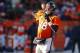 Dec 8, 2013; Denver, CO, USA; Denver Broncos quarterback Peyton Manning (18) throws a pass during the first half against the Tennessee Titans at Sports Authority Field at Mile High. Mandatory Credit: Chris Humphreys-USA TODAY Sports