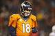 Dec 12, 2013; Denver, CO, USA; Denver Broncos quarterback Peyton Manning (18) reacts during the second half against the San Diego Chargers at Sports Authority Field at Mile High. The Chargers won 27-20. Mandatory Credit: Chris Humphreys-USA TODAY Sports