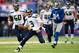 EAST RUTHERFORD, NJ - DECEMBER 15: Quarterback Russell Wilson #3 of the Seattle Seahawks runs with the ball in the 1st half against the New York Giants at MetLife Stadium on December 15, 2013 in East Rutherford, New Jersey. (Photo by Ron Antonelli/Getty I
