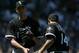 CHICAGO - MAY 22: Starting pitcher Brandon McCarthy #41 of the Chicago White Sox is congratulated by teammate Paul Konerko #14 as he leaves the game in the sixth inning after his first Major League start against the Chicago Cubs on May 22, 2005 at Wrigle