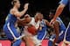 Dec 19, 2013; New York, NY, USA; Duke Blue Devils forward Jabari Parker (1) drives to the basket between UCLA Bruins guard Jordan Adams (3) and forward Travis Wear (left) during the first half at Madison Square Garden. Mandatory Credit: Adam Hunger-USA TO