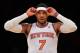 NEW YORK, NY - DECEMBER 16: Carmelo Anthony #7 of the New York Knicks looks on during the second half against the Washington Wizards at Madison Square Garden on December 16, 2013 in New York City. NOTE TO USER: User expressly acknowledges and agrees that