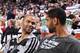 PORTLAND, OR - NOVEMBER 2: Tony Parker #9 and Tim Duncan #21 of the San Antonio Spurs talk to each other against the Portland Trailblazers on November 2, 2013 at the Moda Center Arena in Portland, Oregon. NOTE TO USER: User expressly acknowledges and ag