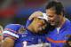 GLENDALE, AZ - JANUARY 08: Head coach Urban Meyer of the Florida Gators celebrates with quarterback Chris Leak #12 after defeating the Ohio State Buckeyes 41-14 during the 2007 Tostitos BCS National Championship Game at the University of Phoenix Stadium