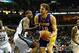 Dec 17, 2013; Memphis, TN, USA; Los Angeles Lakers center Pau Gasol (16) drives to the basket against Memphis Grizzlies power forward Ed Davis (32) during the fourth quarter at FedExForum. Los Angeles Lakers defeat the Memphis Grizzlies 96-92 Mandatory Cr