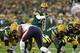 GREEN BAY, WI - NOVEMBER 04: Aaron Rodgers #12 of the Green Bay Packers points out a Chicago Bears defensive formation at Lambeau Field on November 4, 2013 in Green Bay, Wisconsin. The Bears defeated the Packers 27-20. (Photo by Jonathan Daniel/Getty Im