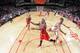 HOUSTON, TX - DECEMBER 18: Jimmy Butler #21 of the Chicago Bulls shoots against the Houston Rockets on December 18, 2013 at the Toyota Center in Houston, Texas. NOTE TO USER: User expressly acknowledges and agrees that, by downloading and or using this p