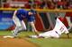 Murphy is seen tagging out Shin-Soo Choo of the Cincinnati Reds.