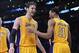 Dec 20, 2013; Los Angeles, CA, USA; Los Angeles Lakers center Pau Gasol (16) and shooting guard Wesley Johnson (11) in the second half of the game against the Minnesota Timberwolves at Staples Center. The Lakers won 104-91. Mandatory Credit: Jayne Kamin-