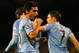 LONDON, ENGLAND - DECEMBER 21: Jesus Navas of Manchester City celebrates scoring their third goal during the Barclays Premier League match between Fulham and Manchester City at Craven Cottage on December 21, 2013 in London, England. (Photo by Clive Rose