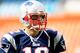 MIAMI GARDENS, FL - DECEMBER 15: Tom Brady #12 of the New England Patriots looks on prior to the game against the Miami Dolphins at Sun Life Stadium on December 15, 2013 in Miami Gardens, Florida. (Photo by Chris Trotman/Getty Images)