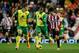 SUNDERLAND, ENGLAND - DECEMBER 21: Ki Sung-Yong of Sunderland takes on Sebastien Bassong of Norwich City (5) during the Barclays Premier League match between Sunderland and Norwich City at Stadium of Light on December 21, 2013 in Sunderland, England. (P
