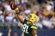 ARLINGTON, TX - DECEMBER 15: Tight end Andrew Quarless #81 of the Green Bay Packers celebrates a third quarter touchdown against the Dallas Cowboys during a game at AT&T Stadium on December 15, 2013 in Arlington, Texas. (Photo by Ronald Martinez/Getty I