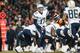 DENVER, CO - DECEMBER 12: Quarterback Philip Rivers #17 of the San Diego Chargers calls a play at the line of scrimmage during a game against the Denver Broncos at Sports Authority Field Field at Mile High on December 12, 2013 in Denver, Colorado. (Phot