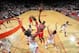HOUSTON, TX - DECEMBER 18: Luol Deng #9 of the Chicago Bulls shoots against the Houston Rockets on December 18, 2013 at the Toyota Center in Houston, Texas. NOTE TO USER: User expressly acknowledges and agrees that, by downloading and or using this photo