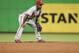 MIAMI, FL - SEPTEMBER 24: Shortstop Jimmy Rollins #11 of the Philadelphia Phillies plays against the Miami Marlins at Marlins Park on September 24, 2013 in Miami, Florida. The Phillies defeated the Marlins 2-1 to give Miami 100 losses for the season. (Pho