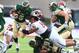 Dec 21, 2013; Albuquerque, NM, USA; Washington State Cougars nose tackle Ioane Gauta (95) loses his helmet as he tackles Colorado State Rams running back Kapri Bibbs (5) in the second quarter during the Gildan New Mexico Bowl at University Stadium. Mandat