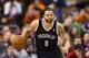 Dec 20, 2013; Philadelphia, PA, USA; Brooklyn Nets guard Deron Williams (8) brings the ball up court during the second quarter against the Philadelphia 76ers at the Wells Fargo Center. Mandatory Credit: Howard Smith-USA TODAY Sports