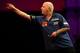 LONDON, ENGLAND - DECEMBER 14: Robert Thornton of Scotland in action during his first round match against Max Hopp of Germany during the Ladbrokes.com World Darts Championship on Day Two at Alexandra Palace on December 14, 2013 in London, England. (Photo