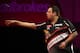 LONDON, ENGLAND - DECEMBER 18: Adrian Lewis of England in action during his first round match against Dennis Smith of England during the Ladbrokes.com World Darts Championship on Day Six at Alexandra Palace on December 18, 2013 in London, England. (Photo