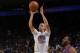 OAKLAND, CA - DECEMBER 21: Stephen Curry #30 of the Golden State Warriors shoots a three pointer against Shawne Williams #3 of the Los Angeles Lakers on December 21, 2013 at Oracle Arena in Oakland, California. NOTE TO USER: User expressly acknowledges an