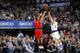 DALLAS, TX - DECEMBER 20: Kyle Lowry #7 of the Toronto Raptors shoots a jumper against Jose Calderon #8 of the Dallas Mavericks on December 20, 2013 at the American Airlines Center in Dallas, Texas. NOTE TO USER: User expressly acknowledges and agrees tha