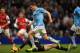 MANCHESTER, ENGLAND - DECEMBER 14: James Milner of Manchester City is brought down for a penalty by Wojciech Szczesny of Arsenal during the Barclays Premier League match between Manchester City and Arsenal at Etihad Stadium on December 14, 2013 in Manche