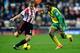 SUNDERLAND ENGLAND, DECEMBER 21: Lee Cattermole of Sunderland and Leroy Feer of Norwich City in action during the Barclays Premier League match between Sunderland and Norwich City at the Stadium of Light on December 21, 2013 in Sunderland, England. (Photo