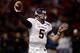 NEW ORLEANS, LA - DECEMBER 22: Shane Carden #5 of the East Carolina Pirates looks to throw a pass against the Louisiana-Lafayette Ragin Cajuns during the R+L Carriers New Orleans Bowl at the Mercedes-Benz Superdome on December 22, 2012 in New Orleans, Lo