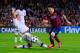 BARCELONA, SPAIN - NOVEMBER 06: Lionel Messi of FC Barcelona duels for the ball with Philippe Mexes of AC Milan during the UEFA Champions League Group H match Between FC Barcelona and AC Milan at Camp Nou on November 6, 2013 in Barcelona, Spain. (Photo