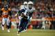 DENVER, CO - DECEMBER 12: Wide receiver Keenan Allen #13 of the San Diego Chargers runs for yards after the catch and a touchdown at Sports Authority Field Field at Mile High on December 12, 2013 in Denver, Colorado. (Photo by Dustin Bradford/Getty Imag