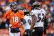 DENVER, CO - JANUARY 12: Peyton Manning (L) #18 of the Denver Broncos stnads on the field next to Ray Lewis #52 of the Baltimore Ravens during the AFC Divisional Playoff Game at Sports Authority Field at Mile High on January 12, 2013 in Denver, Colorado.