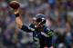 SEATTLE - DECEMBER 22: Russell Wilson #3 of the Seattle Seahawks throws against the Arizona Cardinals on December 22, 2013 at CenturyLink Field in Seattle, Washington. (Photo by Jonathan Ferrey/Getty Images)