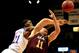 LAWRENCE, KS - NOVEMBER 08: Joel Embiid #21 of the Kansas Jayhawks and Nick Coppola #11 of the Louisiana Monroe Warhawks compete for a rebound during the game at Allen Fieldhouse on November 8, 2013 in Lawrence, Kansas. (Photo by Jamie Squire/Getty Imag