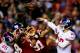 LANDOVER, MD - DECEMBER 01: Eli Manning #10 of the New York Giants throws the ball against the Washington Redskins during their game at FedExField on December 1, 2013 in Landover, Maryland. (Photo by Rob Carr/Getty Images)