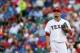 Jul 24, 2013; Arlington, TX, USA; Texas Rangers starting pitcher Matt Garza (22) reacts during the first inning against the New York Yankees at Rangers Ballpark in Arlington. Mandatory Credit: Kevin Jairaj-USA TODAY Sports
