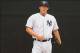 February 24, 2013; Tampa, FL, USA; New York Yankees starting pitcher Adam Warren (61) gets ready to picth before the game against the Toronto Blue Jays during spring training at George M. Steinbrenner Field. Mandatory Credit: Kim Klement-USA TODAY Sports